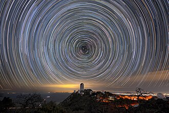 Kitt Peak National Observatory Beneath Star Trails (noirlab2512ae)